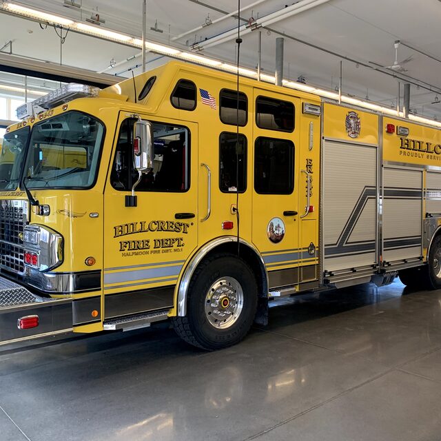 Hillcrest Fire Department's yellow ER 34-3 apparatus in Halfmoon
